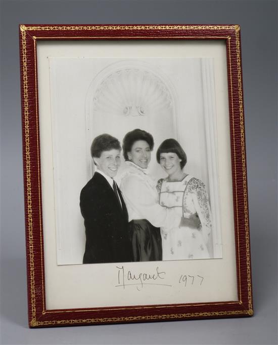 A presentation portrait photograph of Princess Margaret, David Armstrong-Jones and Lady Sarah Chatto